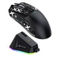 Gaming mouse with charging base on a white background