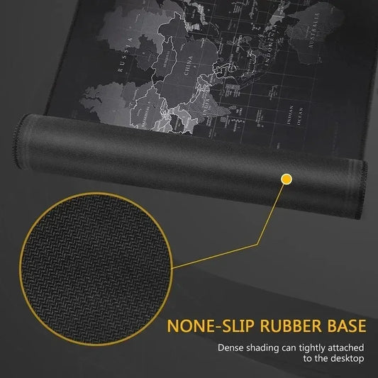 Black desk mat with a world map design and a close-up of the none-slip rubber base.